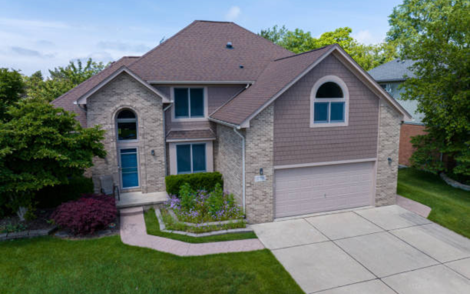 Large suburban Michigan home used to illustrate HVAC replacement planning